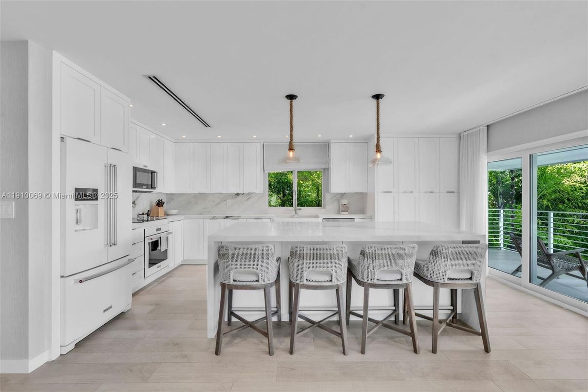 Interior, Kitchen, Marble Walls, Pendant Lights, Recessed Lighting, Stainless Steel Appliances, Wood Texture Flooring