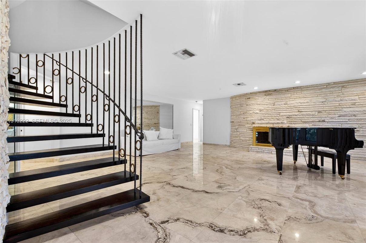 Fireplace, Interior, Piano, Recessed Lighting, Stone Walls