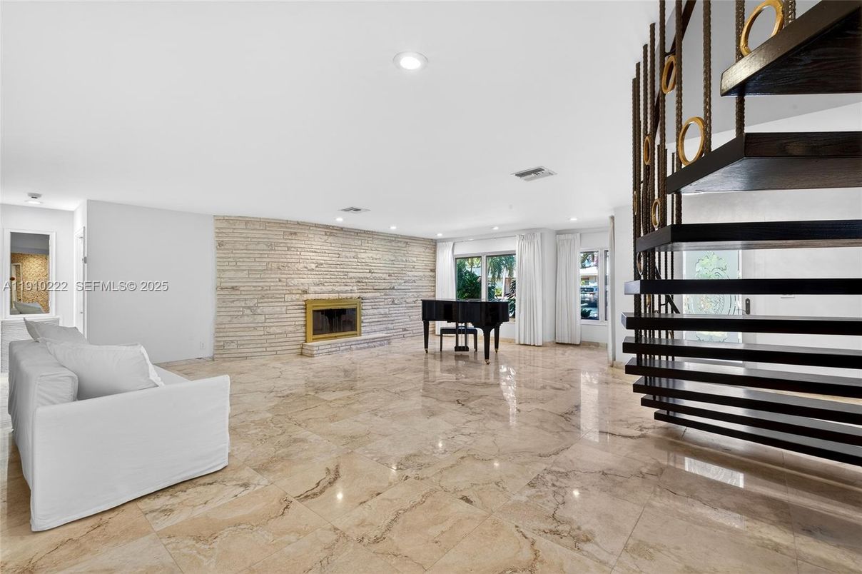 Fireplace, Interior, Piano, Recessed Lighting, Stone Walls