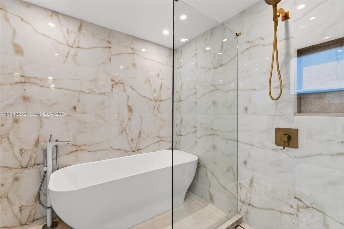 Bathroom, Free Standing Baths, Glass Shower, Interior, Marble Walls, Recessed Lighting