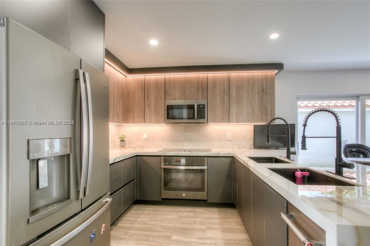 Interior, Kitchen, Recessed Lighting, Stainless Steel Appliances, Wood Texture Flooring