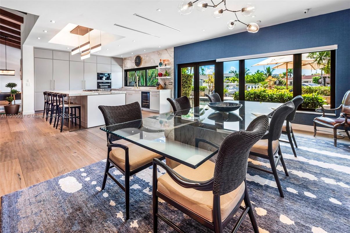 Dining room, Interior, Kitchen, Pendant Lights, Recessed Lighting, Stainless Steel Appliances, Wood Texture Flooring