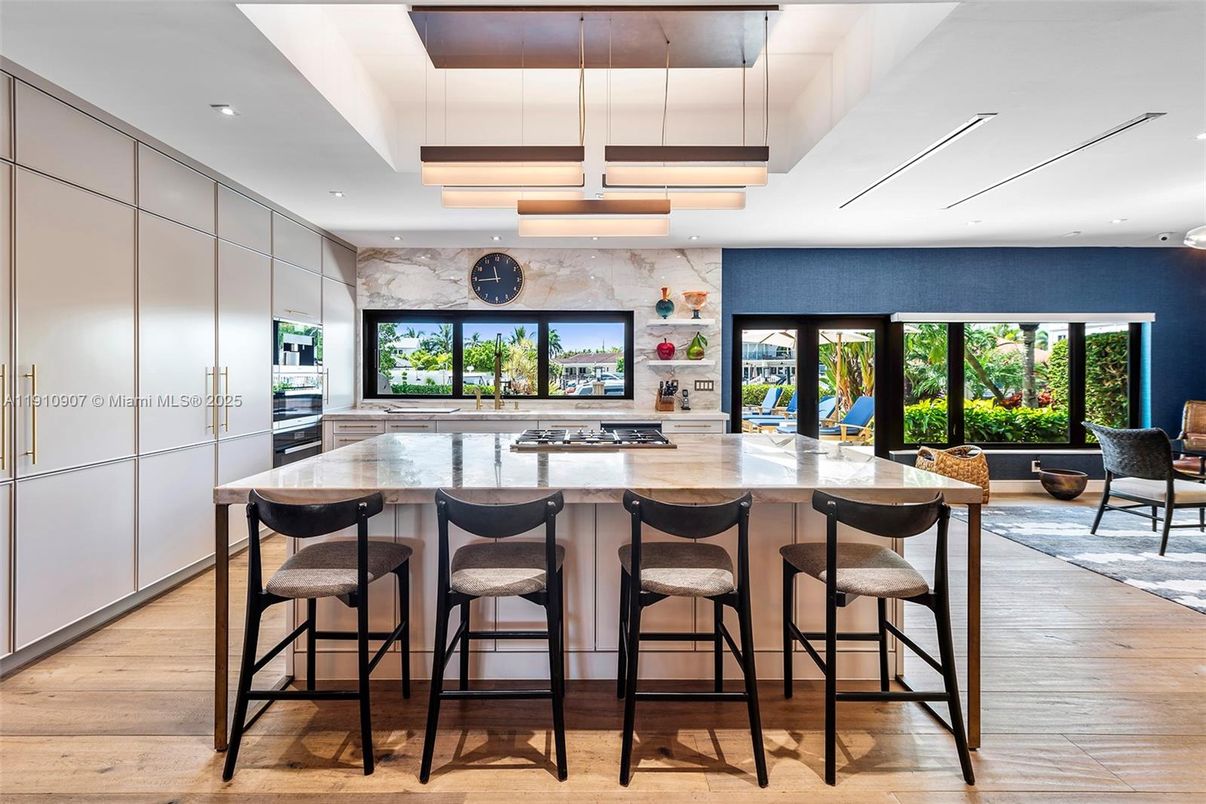 Interior, Kitchen, Marble Walls, Pendant Lights, Recessed Lighting, Wood Texture Flooring