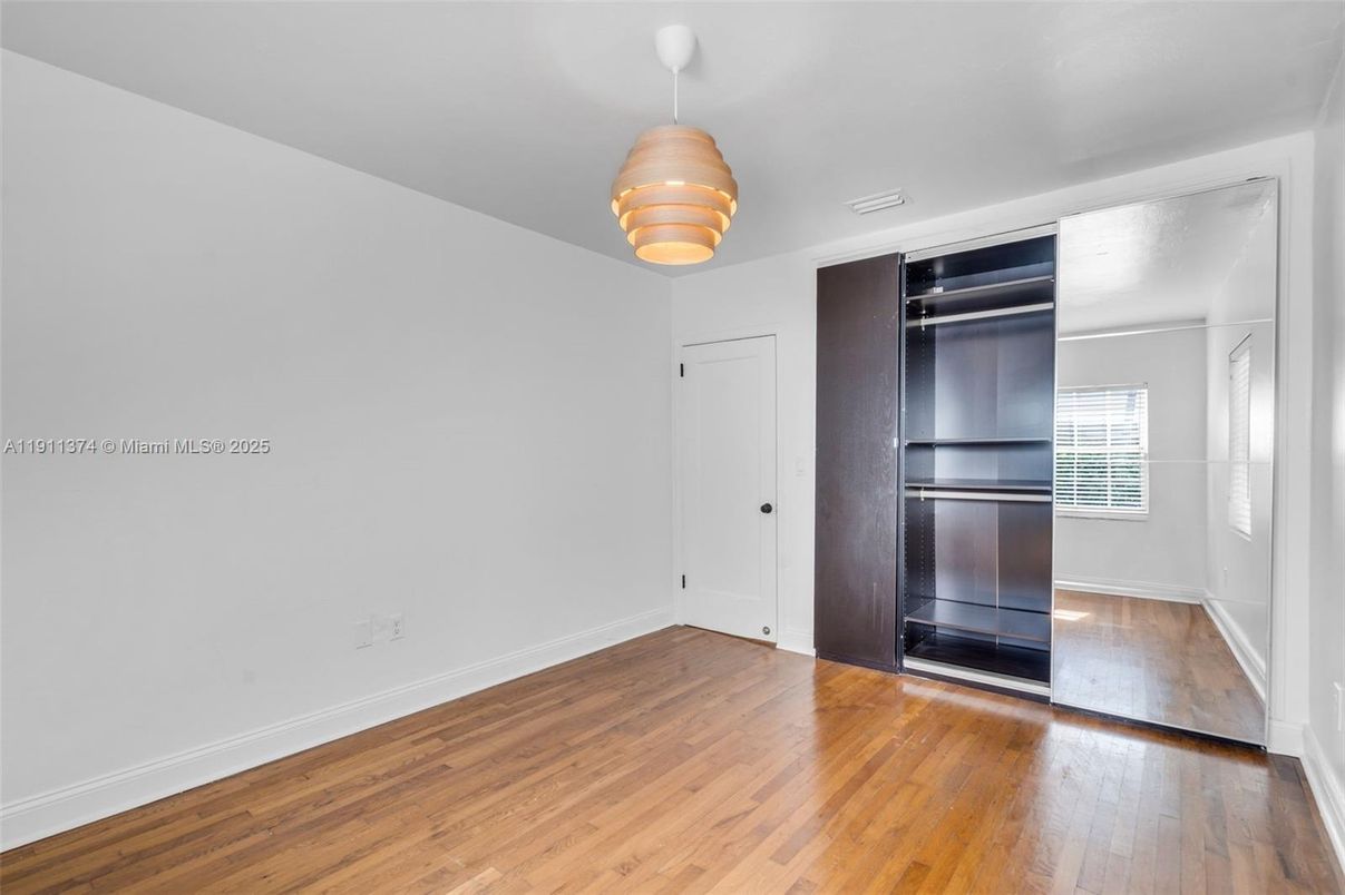 Empty room, Interior, Kitchen, Stainless Steel Appliances, Wood Texture Flooring