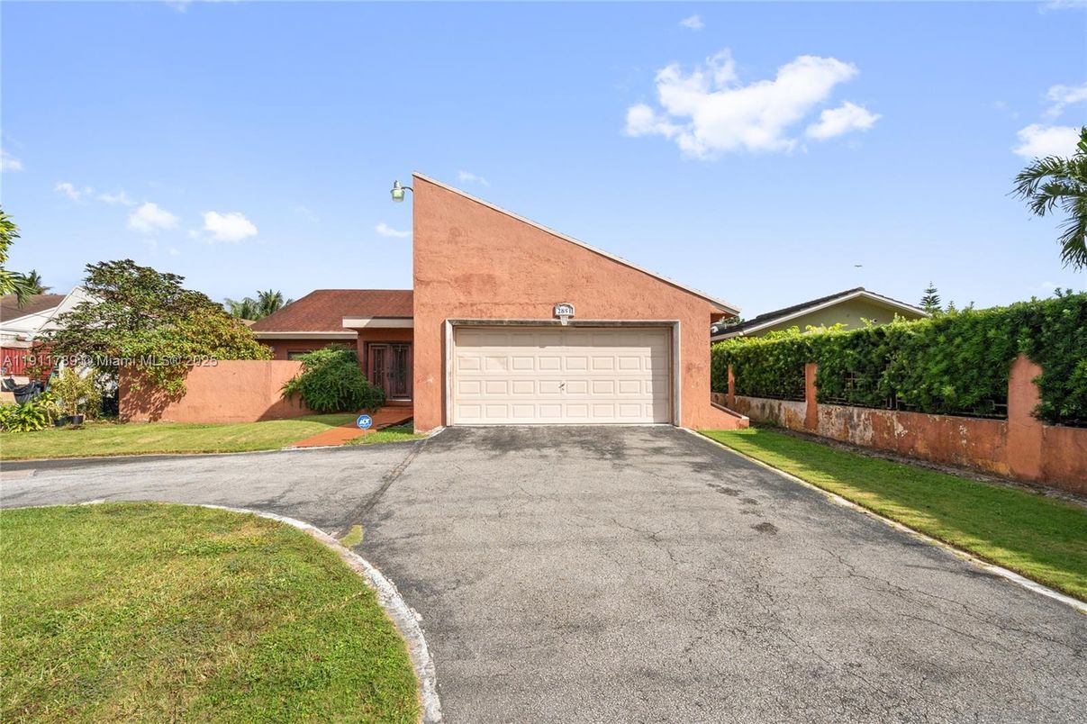 Attached, Exterior, Facade, Brick Facade, Spanish Mediterranean