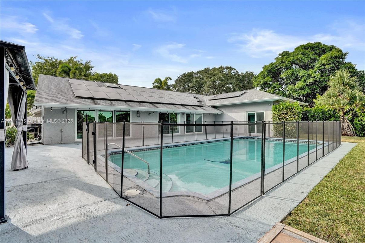 Exterior, Pool, Solar Panels