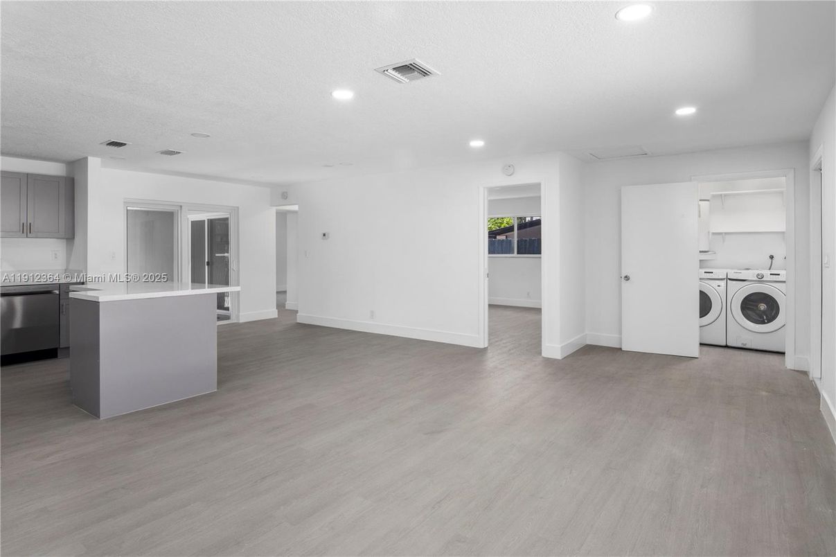 Interior, Kitchen, Recessed Lighting, Utility Closets, Washer, Wood Texture Flooring