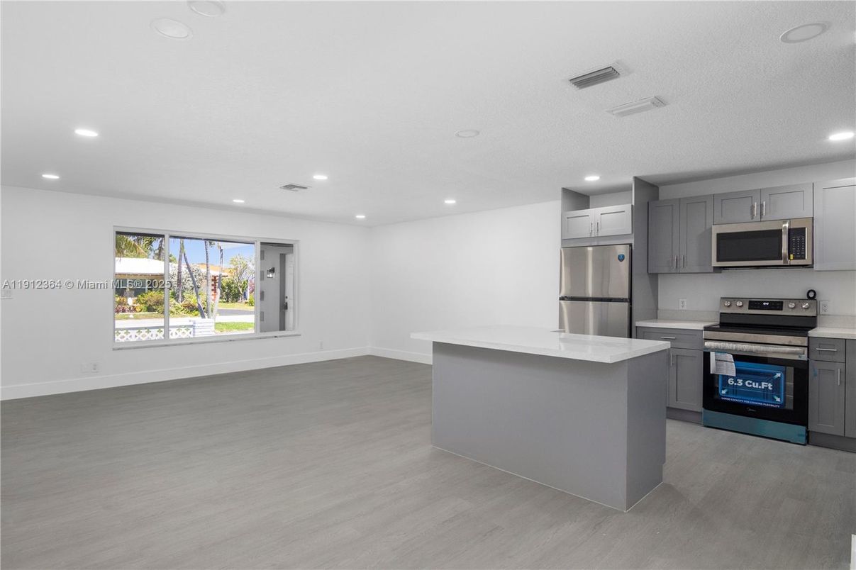 Interior, Kitchen, Recessed Lighting, Stainless Steel Appliances, Wood Texture Flooring