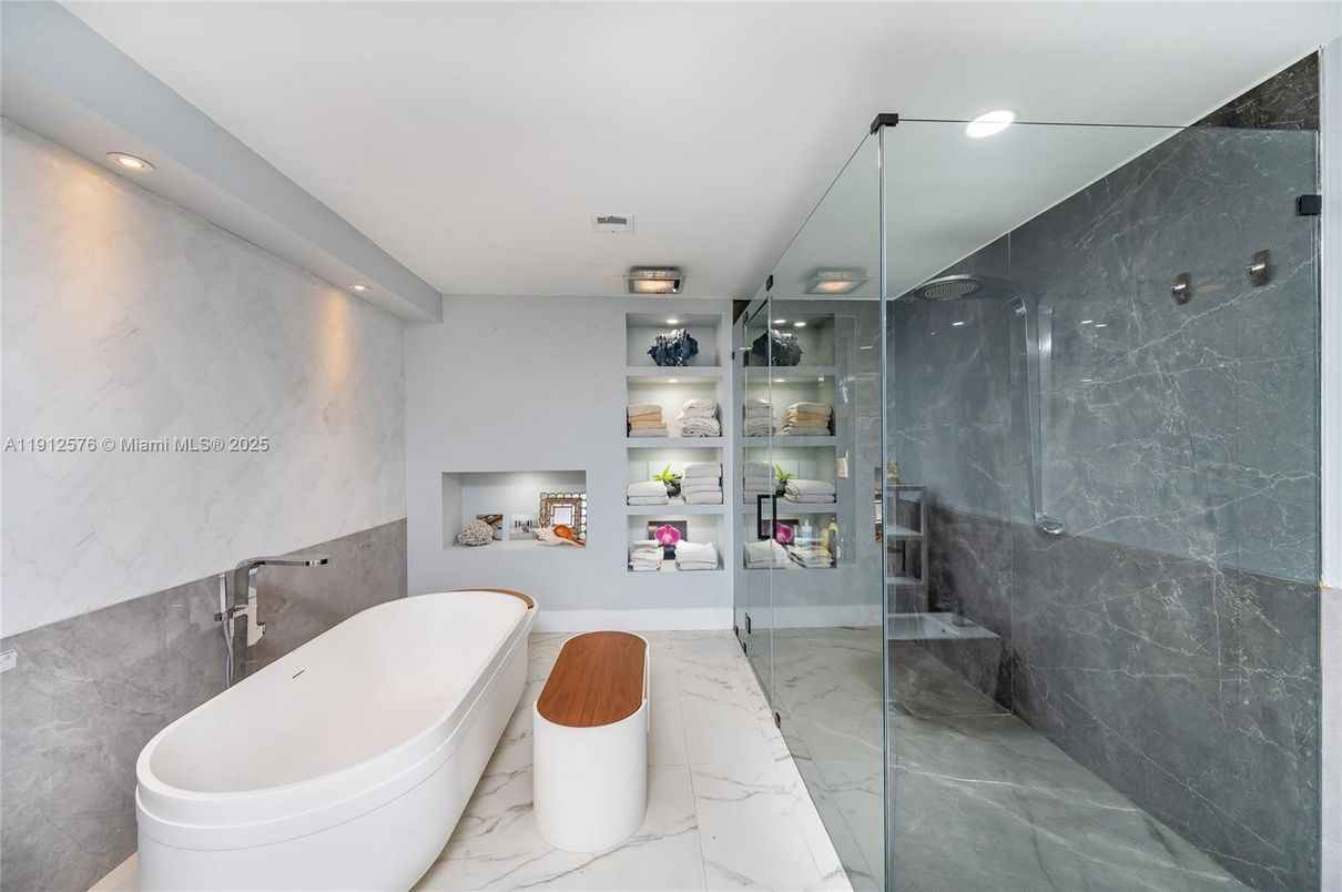 Bathroom, Free Standing Baths, Glass Shower, Interior, Marble, Marble Walls, Recessed Lighting