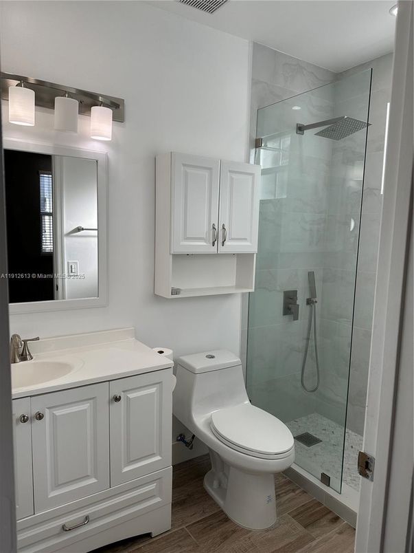 Bathroom, Glass Shower, Interior, Marble Walls, Wood Texture Flooring