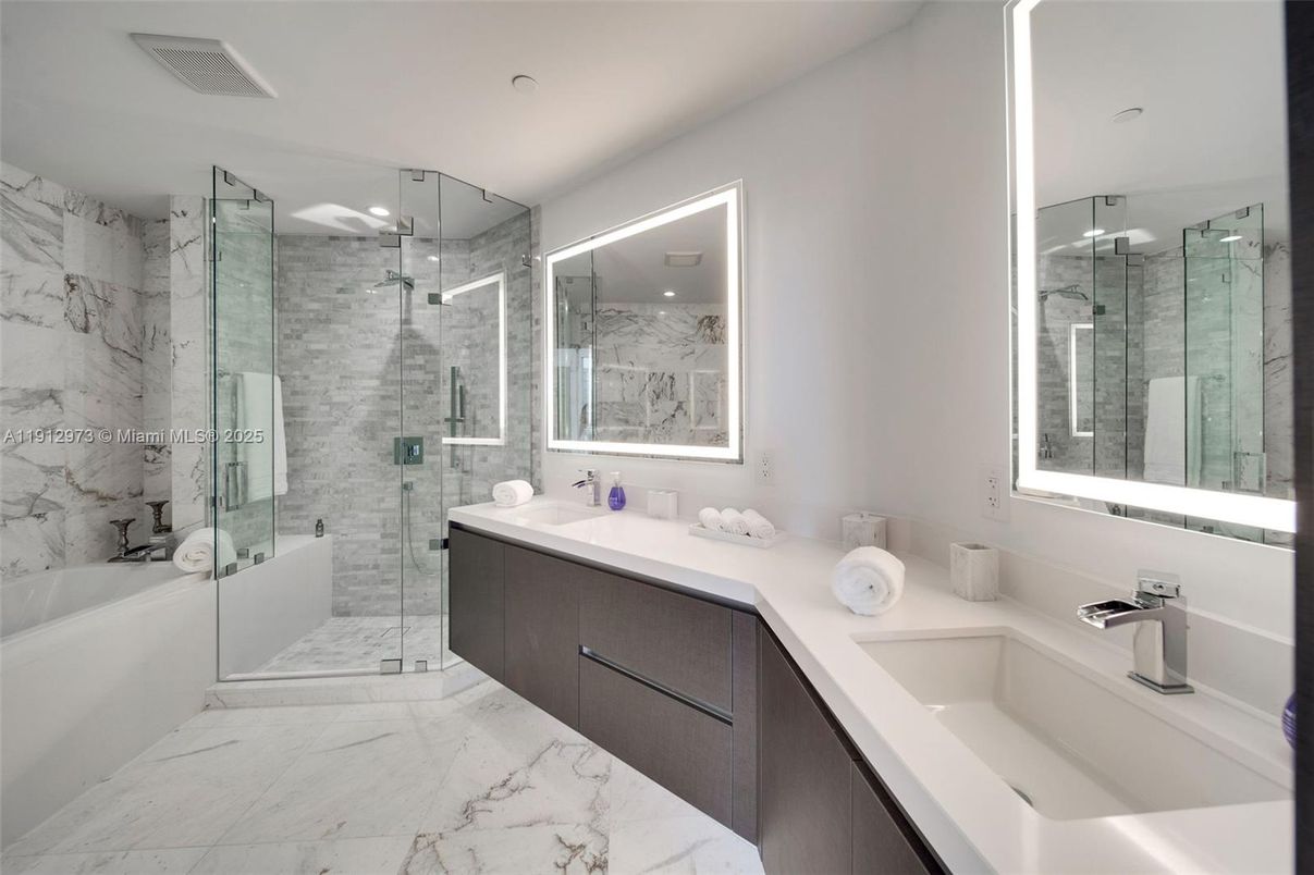 Bathroom, Dual Sink Vanities, Glass Shower, Interior, Marble, Marble Walls, Recessed Lighting