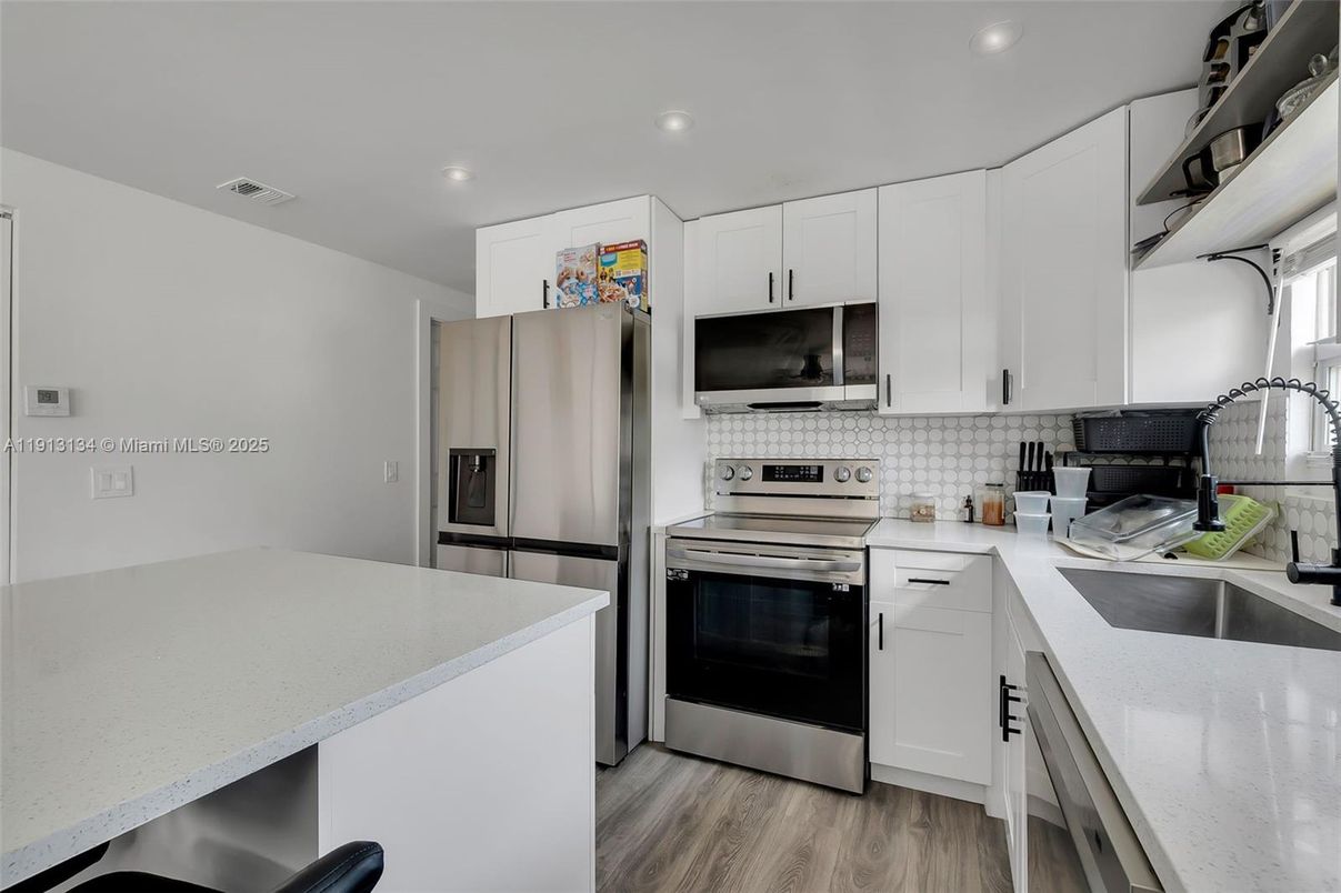 Interior, Kitchen, Recessed Lighting, Stainless Steel Appliances, Wood Texture Flooring