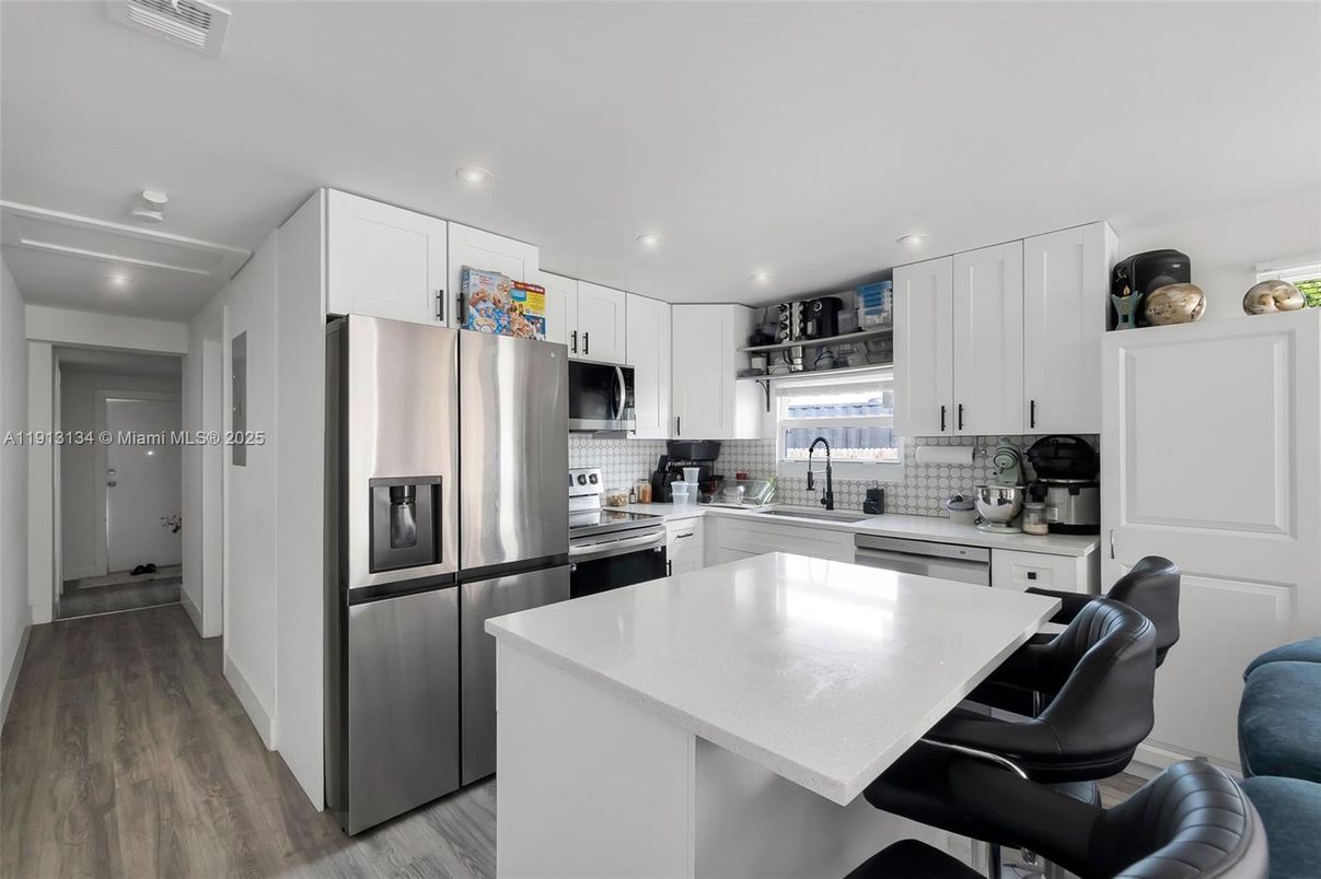 Interior, Kitchen, Recessed Lighting, Stainless Steel Appliances, Wood Texture Flooring