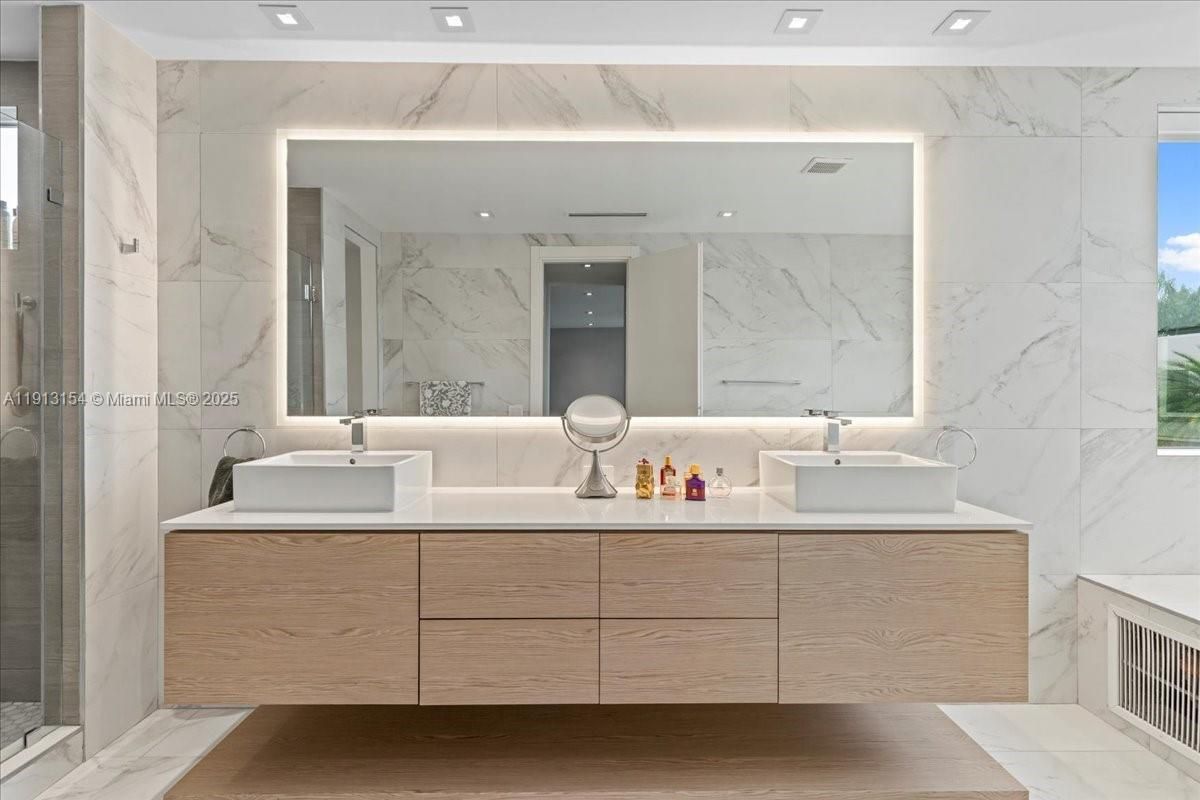 Bathroom, Dual Sink Vanities, Glass Shower, Interior, Marble, Marble Walls, Recessed Lighting