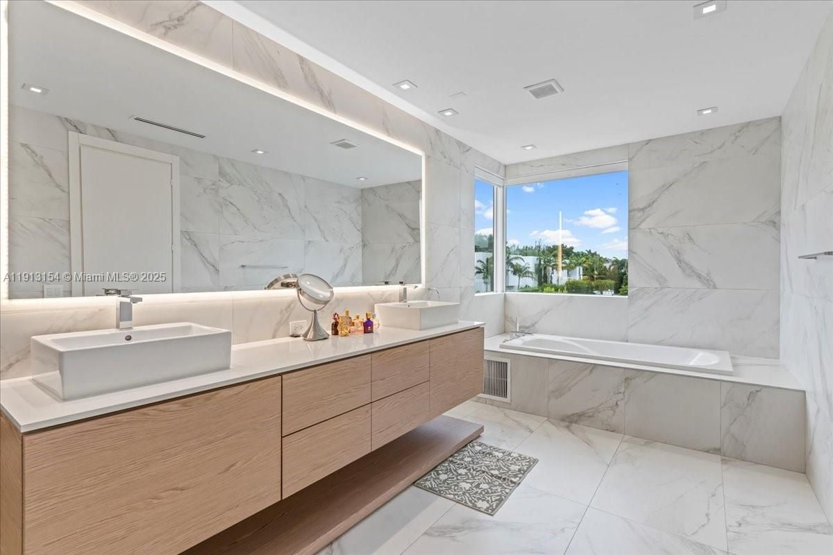 Bathroom, Dual Sink Vanities, Interior, Marble, Marble Walls, Recessed Lighting