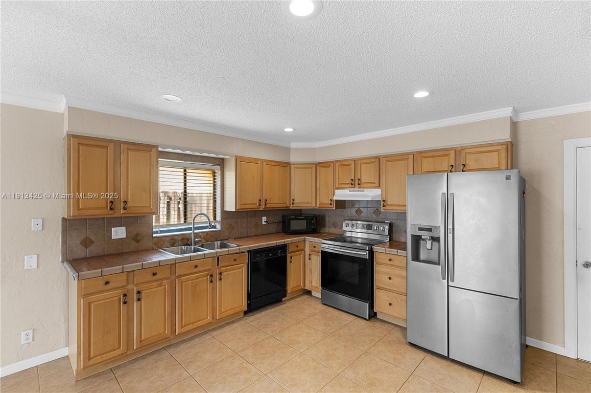 Interior, Kitchen, Recessed Lighting, Tile Countertops