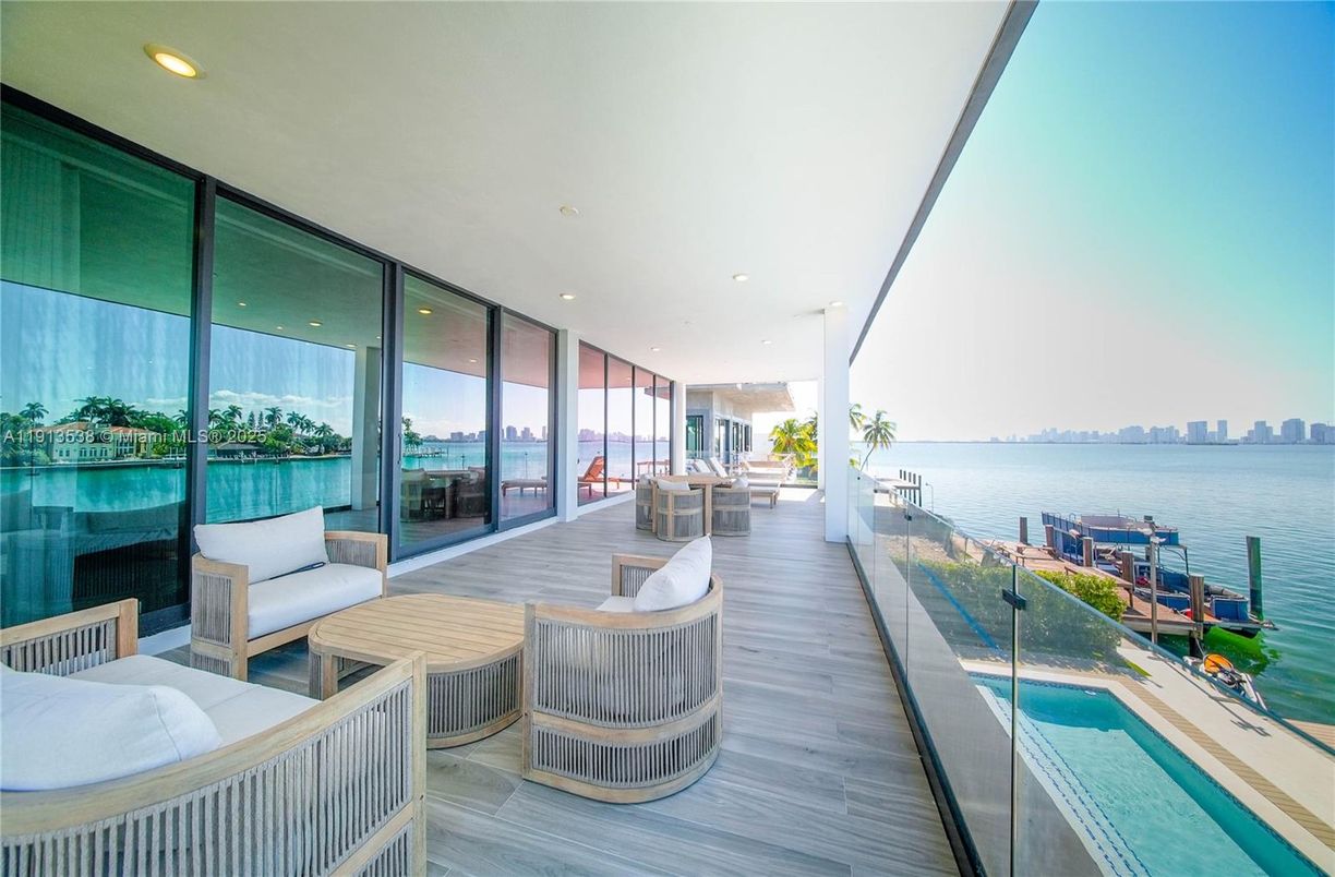 Exterior, Pool, Recessed Lighting, Water, Wood Texture Flooring