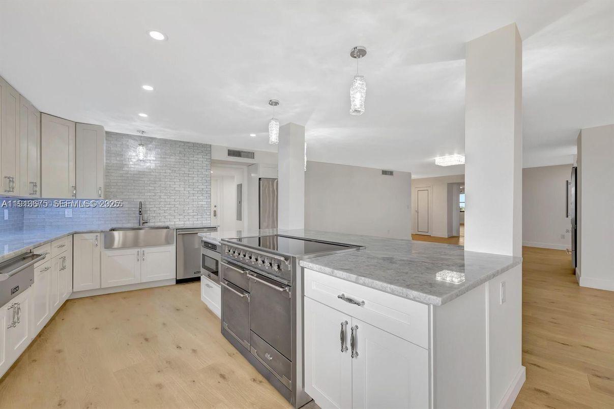Interior, Kitchen, Pendant Lights, Recessed Lighting, Stainless Steel Appliances, Wood Texture Flooring
