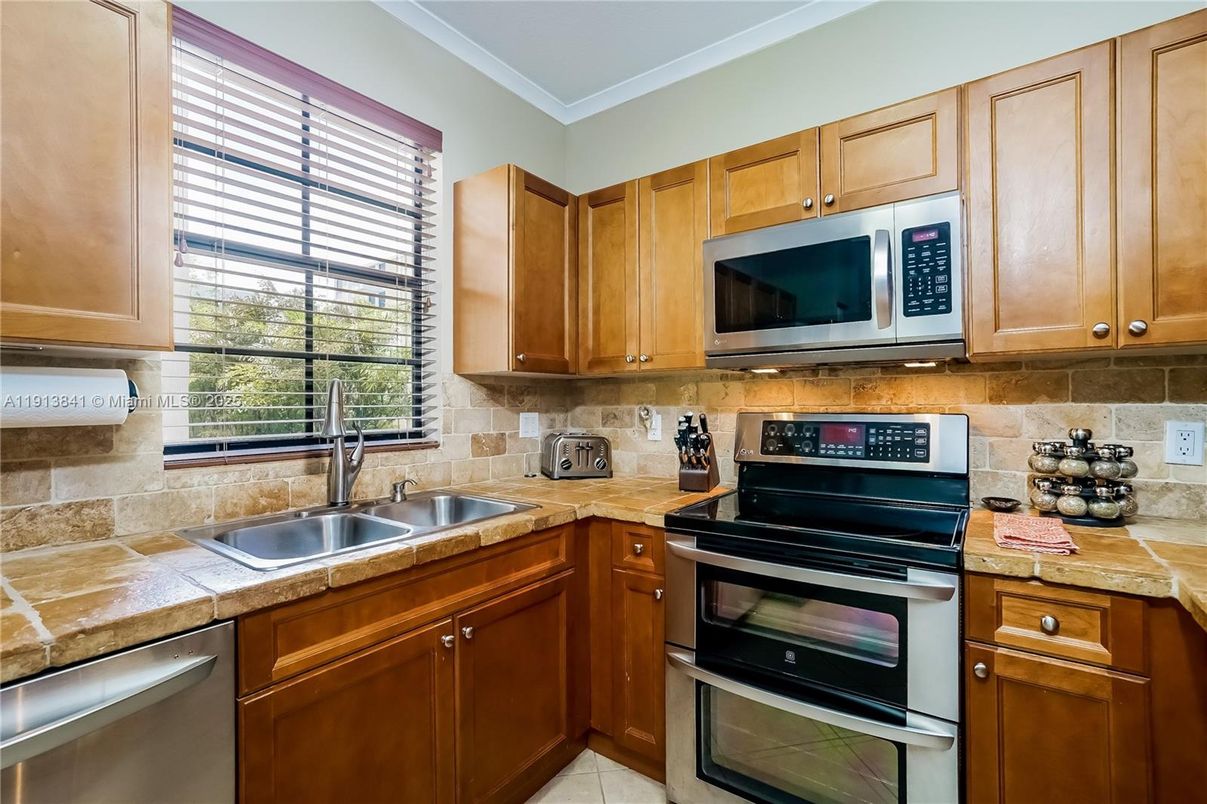 Interior, Kitchen, Stainless Steel Appliances, Tile Countertops