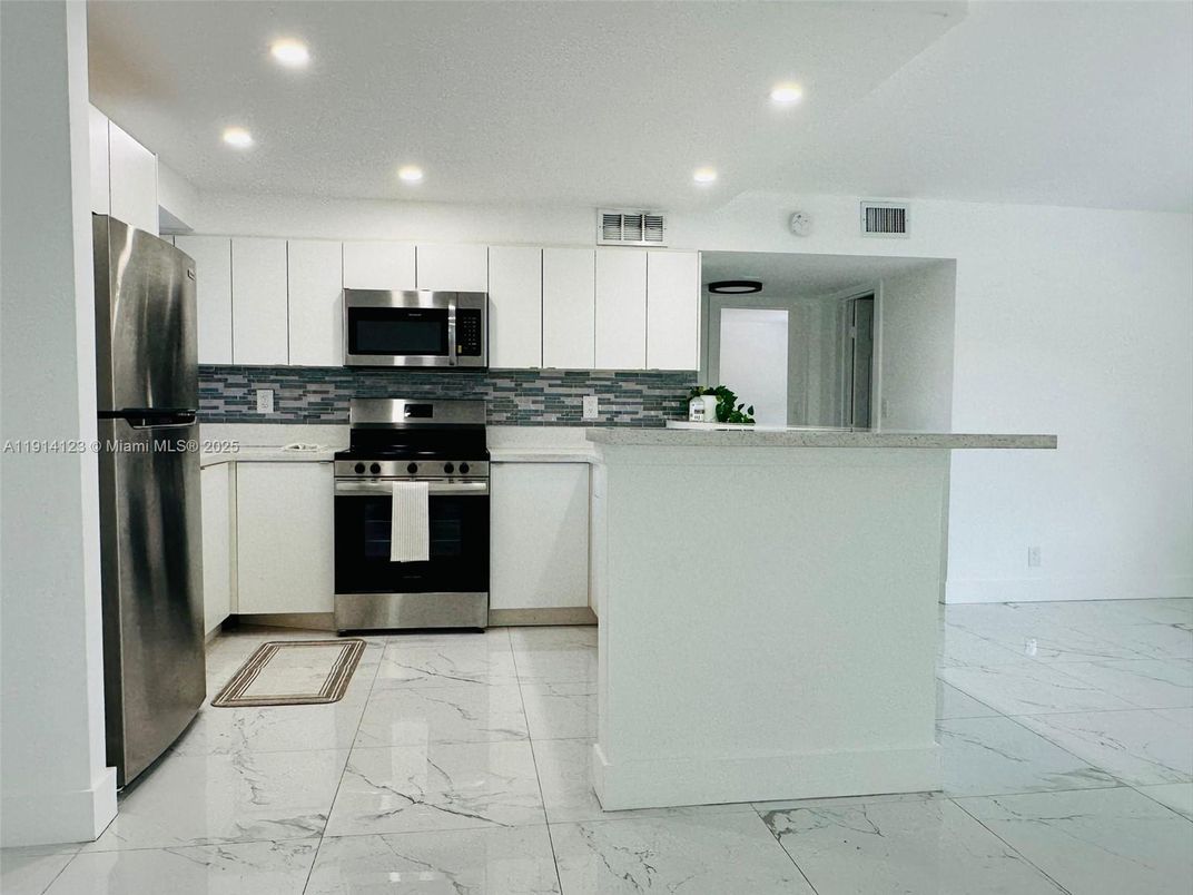 Interior, Kitchen, Marble, Recessed Lighting, Stainless Steel Appliances