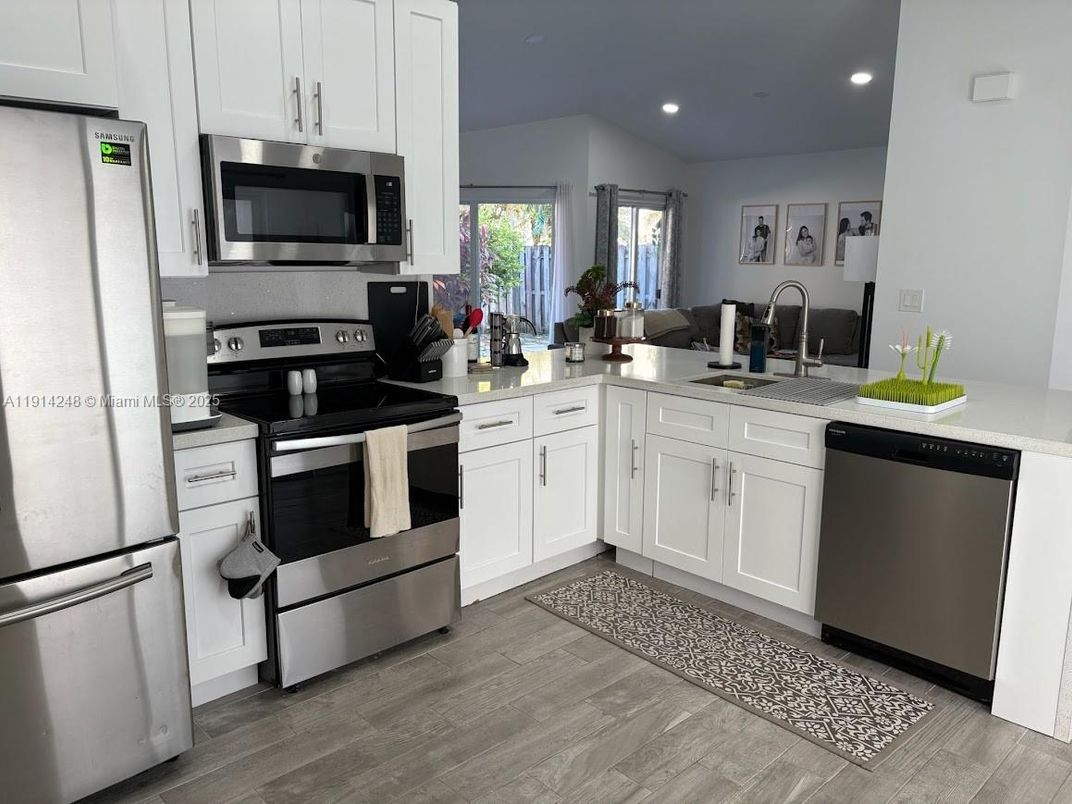 Interior, Kitchen, Recessed Lighting, Stainless Steel Appliances, Wood Texture Flooring
