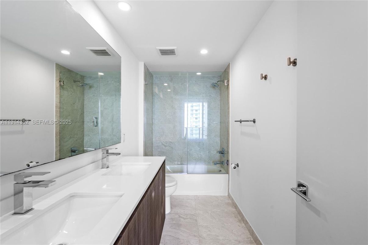 Bathroom, Dual Sink Vanities, Glass Shower, Interior, Marble, Recessed Lighting