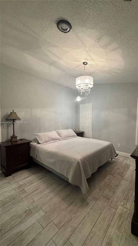 Bedroom, Chandelier, Interior, Wood Texture Flooring