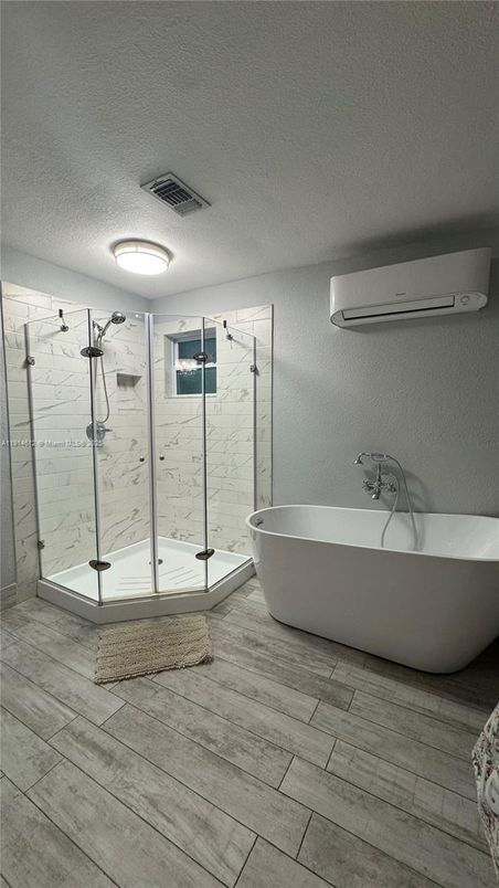 Bathroom, Free Standing Baths, Glass Shower, Interior, Marble Walls, Wood Texture Flooring