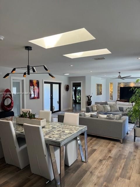 Dining room, Interior, Living room, Pendant Lights, Recessed Lighting, Wood Texture Flooring