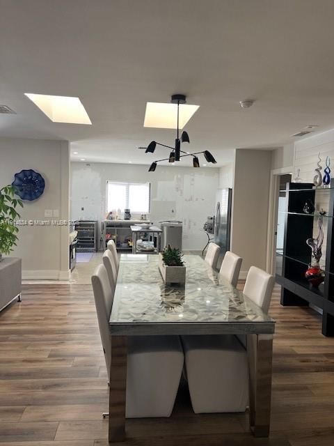 Dining room, Interior, Kitchen, Living room, Pendant Lights, Stainless Steel Appliances, Wood Texture Flooring