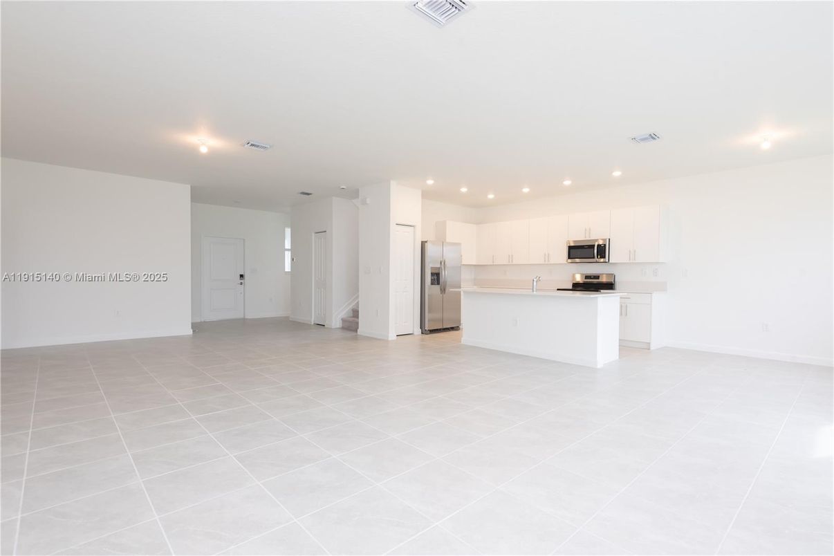 Empty room, Interior, Kitchen, Recessed Lighting, Stainless Steel Appliances