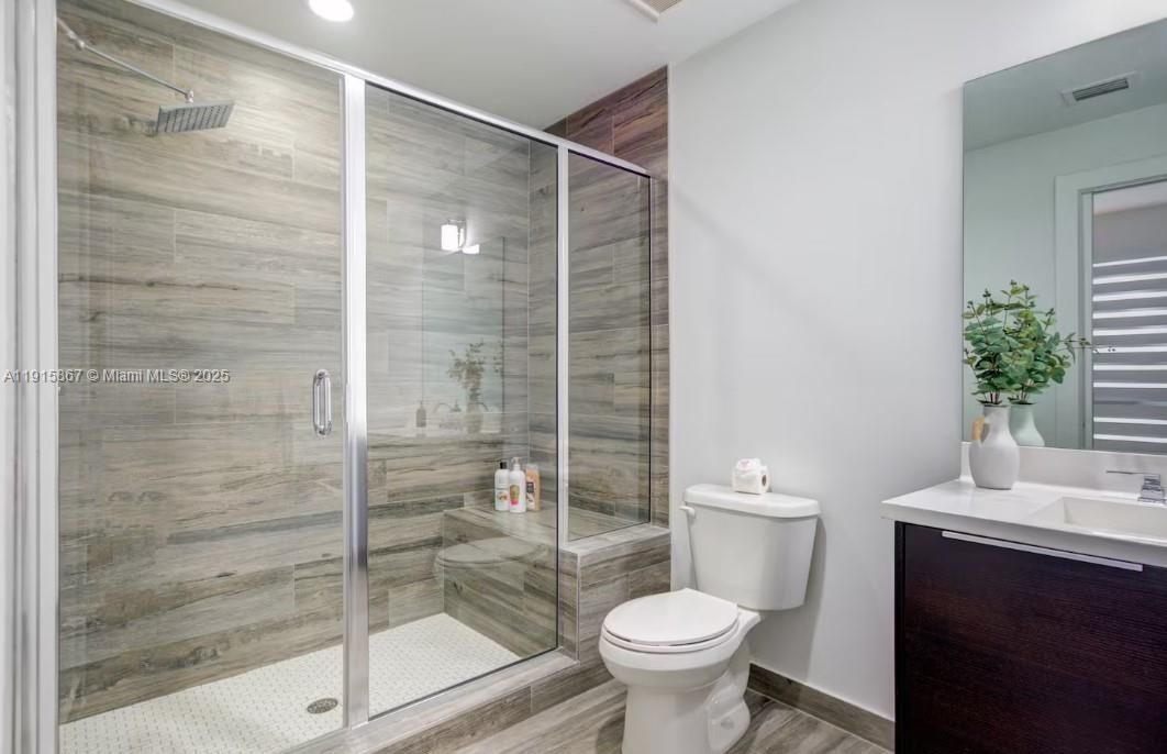 Bathroom, Glass Shower, Interior, Recessed Lighting, Wood Texture Flooring