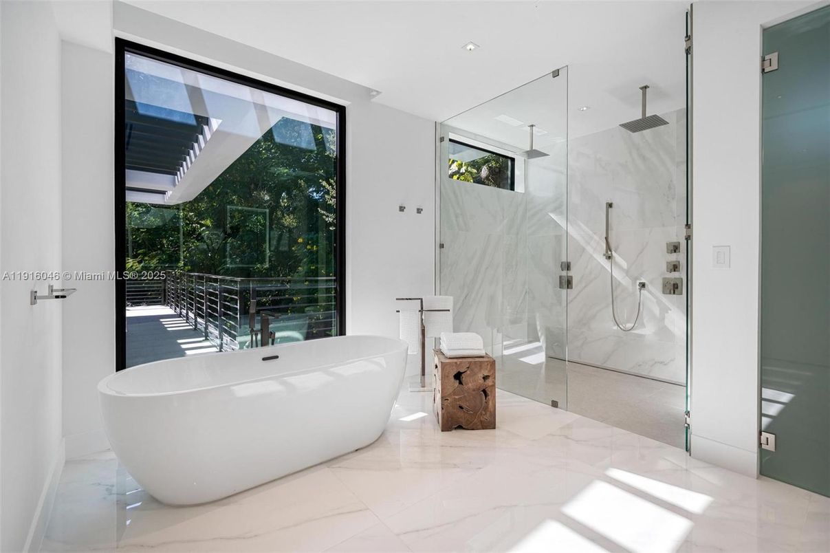 Bathroom, Free Standing Baths, Glass Shower, Interior, Marble, Marble Walls, Recessed Lighting