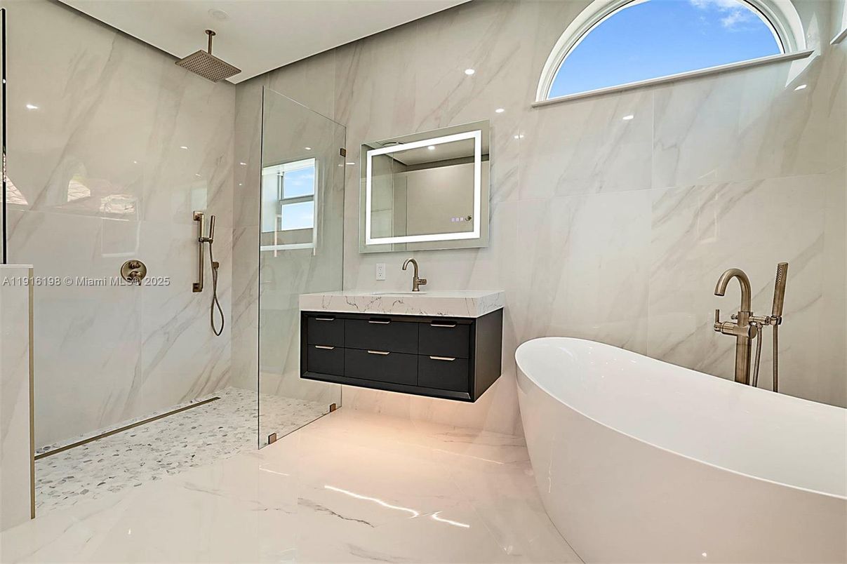 Bathroom, Free Standing Baths, Glass Shower, Interior, Marble, Marble Walls, Recessed Lighting