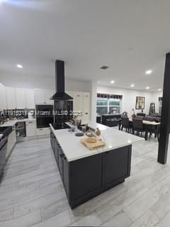 Dining room, Interior, Kitchen, Recessed Lighting, Stainless Steel Appliances, Wood Texture Flooring