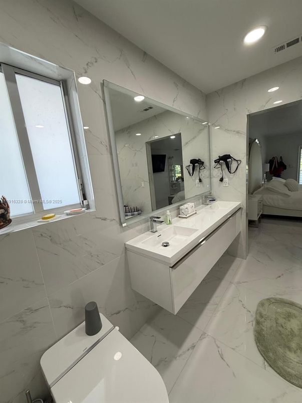 Bathroom, Bedroom, Dual Sink Vanities, Interior, Marble, Marble Walls, Recessed Lighting