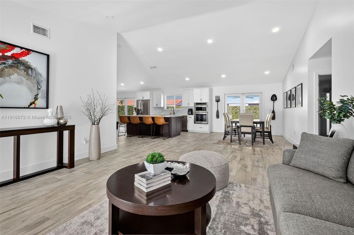 Dining room, Interior, Kitchen, Living room, Recessed Lighting, Stainless Steel Appliances, Wood Texture Flooring