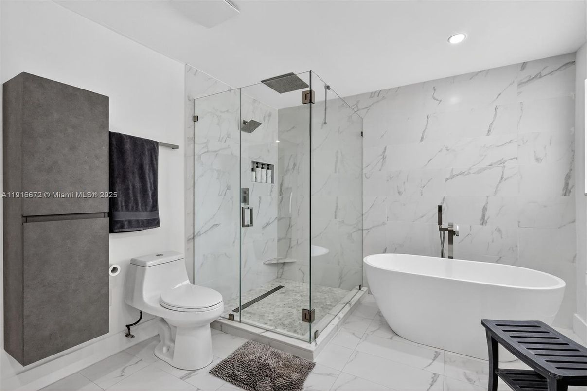 Bathroom, Free Standing Baths, Glass Shower, Interior, Marble, Marble Walls, Recessed Lighting