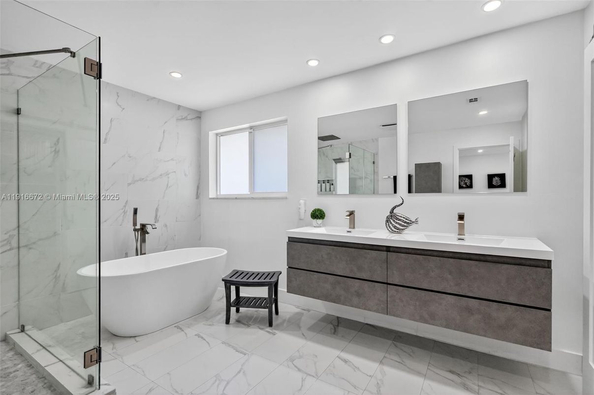 Bathroom, Dual Sink Vanities, Free Standing Baths, Glass Shower, Interior, Marble, Marble Walls, Recessed Lighting