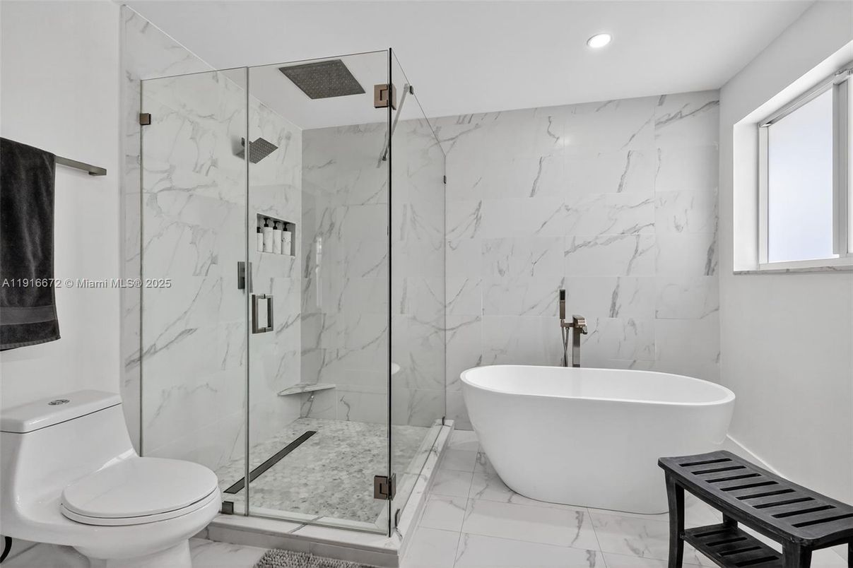Bathroom, Free Standing Baths, Glass Shower, Interior, Marble, Marble Walls, Recessed Lighting