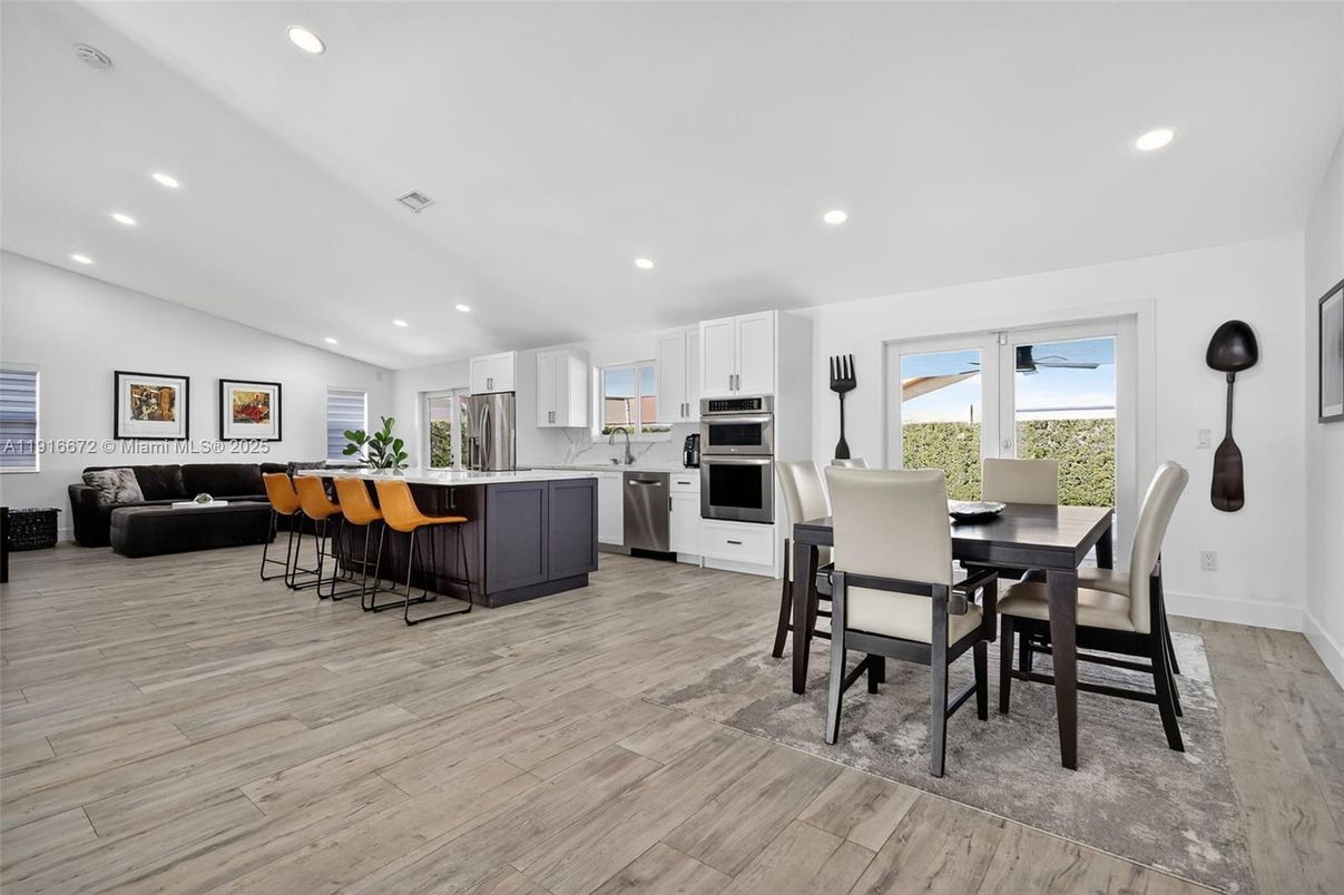 Dining room, Interior, Kitchen, Living room, Recessed Lighting, Stainless Steel Appliances, Wood Texture Flooring