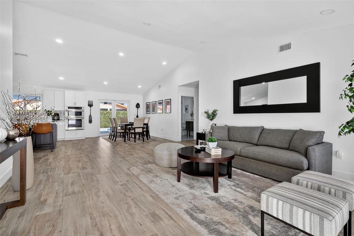 Dining room, Interior, Kitchen, Living room, Recessed Lighting, Stainless Steel Appliances, Wood Texture Flooring