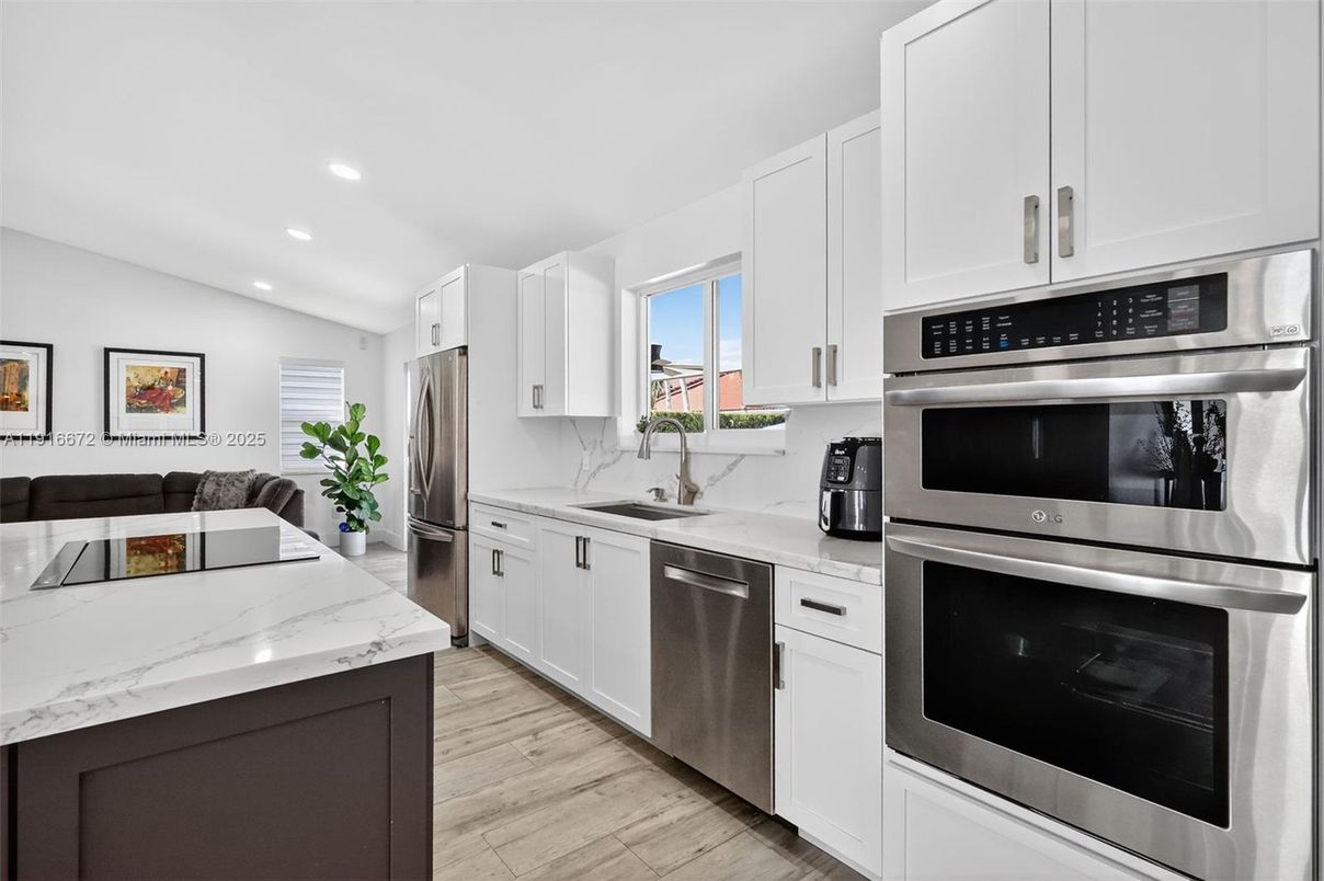 Interior, Kitchen, Recessed Lighting, Stainless Steel Appliances, Wood Texture Flooring