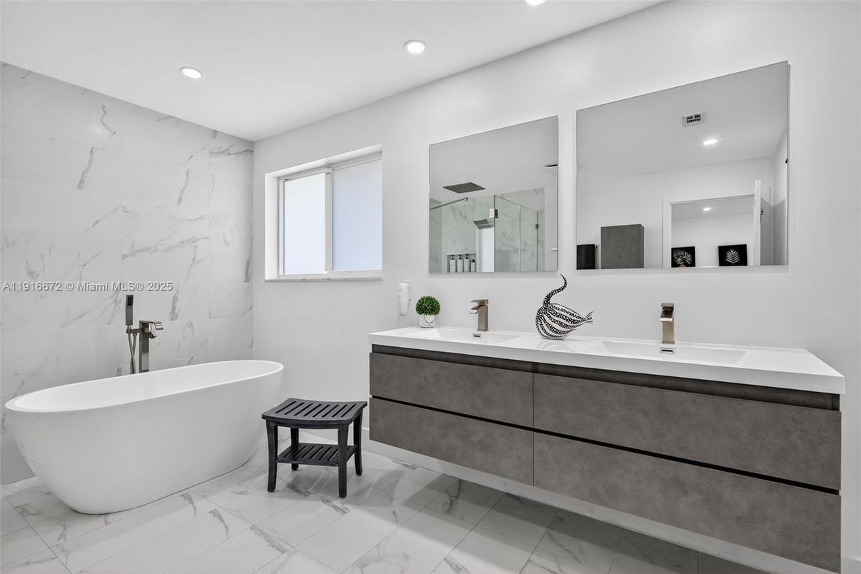 Bathroom, Dual Sink Vanities, Free Standing Baths, Interior, Marble, Marble Walls, Recessed Lighting