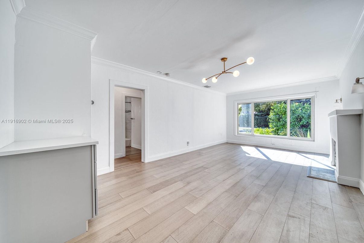 Empty room, Fireplace, Interior, Pendant Lights, Wood Texture Flooring