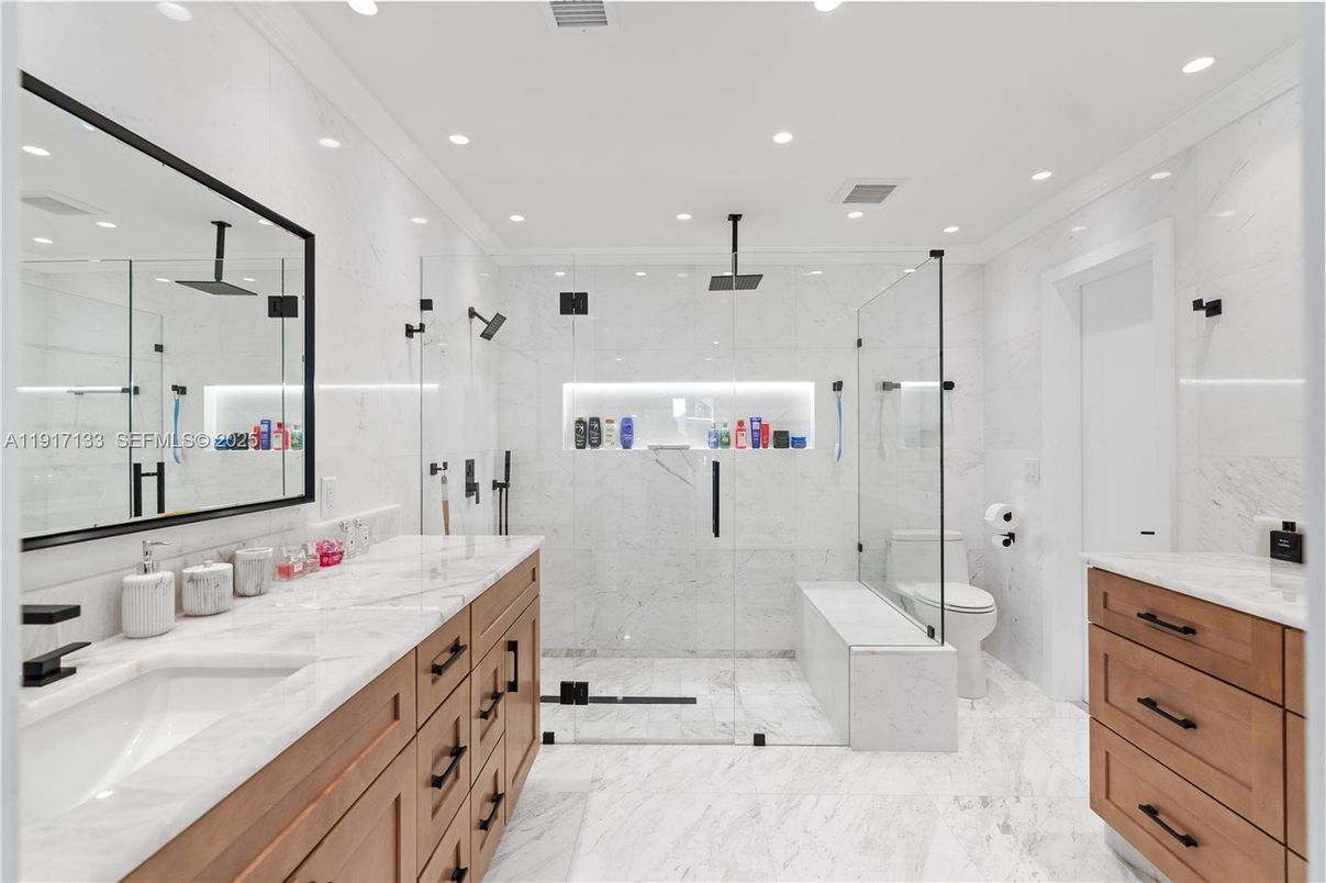Bathroom, Dual Sink Vanities, Glass Shower, Interior, Marble, Marble Walls, Recessed Lighting
