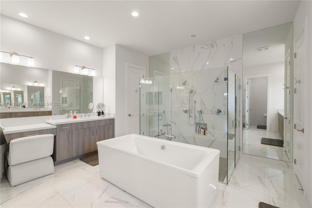 Bathroom, Free Standing Baths, Glass Shower, Interior, Marble, Marble Walls, Recessed Lighting