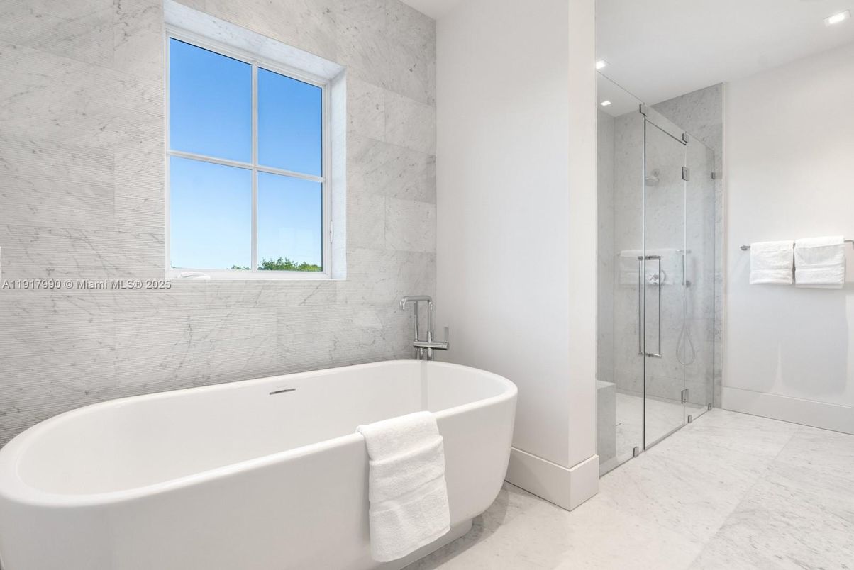 Bathroom, Free Standing Baths, Glass Shower, Interior, Marble Walls, Recessed Lighting