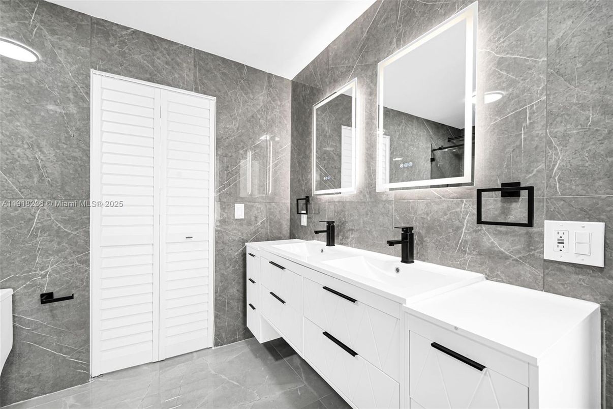 Bathroom, Dual Sink Vanities, Interior, Marble Walls, Recessed Lighting