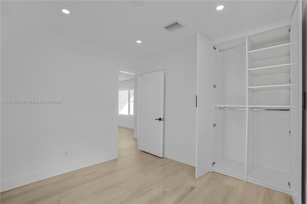 Empty room, Interior, Recessed Lighting, Walk-in Closets, Wood Texture Flooring